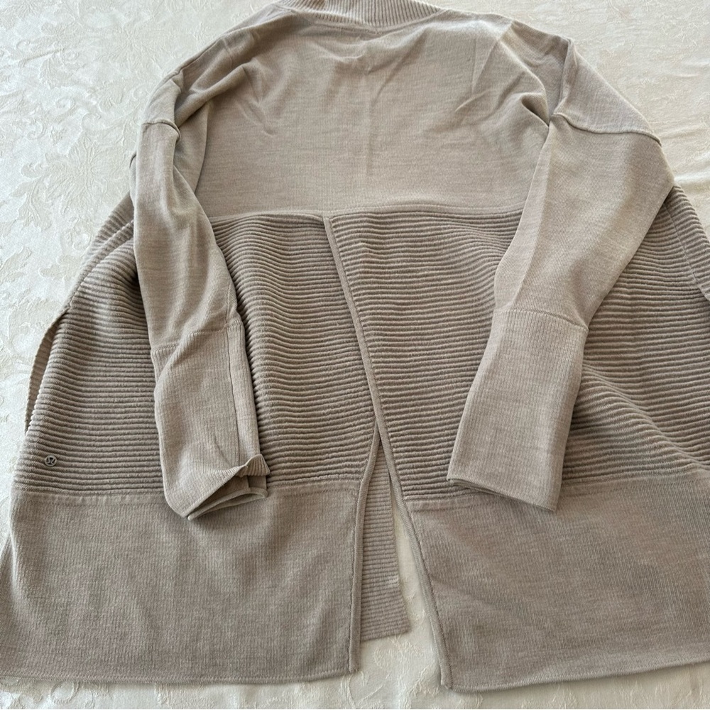 Tan Lululemon split back cardigan size 12